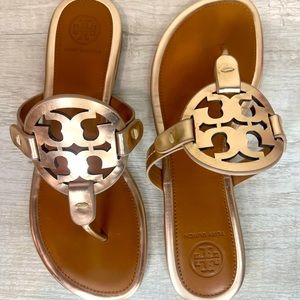 Miller Sandal, Metallic Leather
Color: ROSE GOLD / TAN Size: 6 
Style #63252